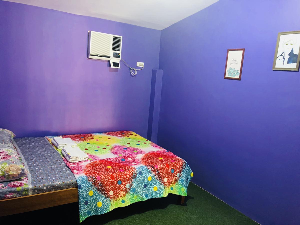 Colors Boutique Hostel Puerto Princesa Exterior photo